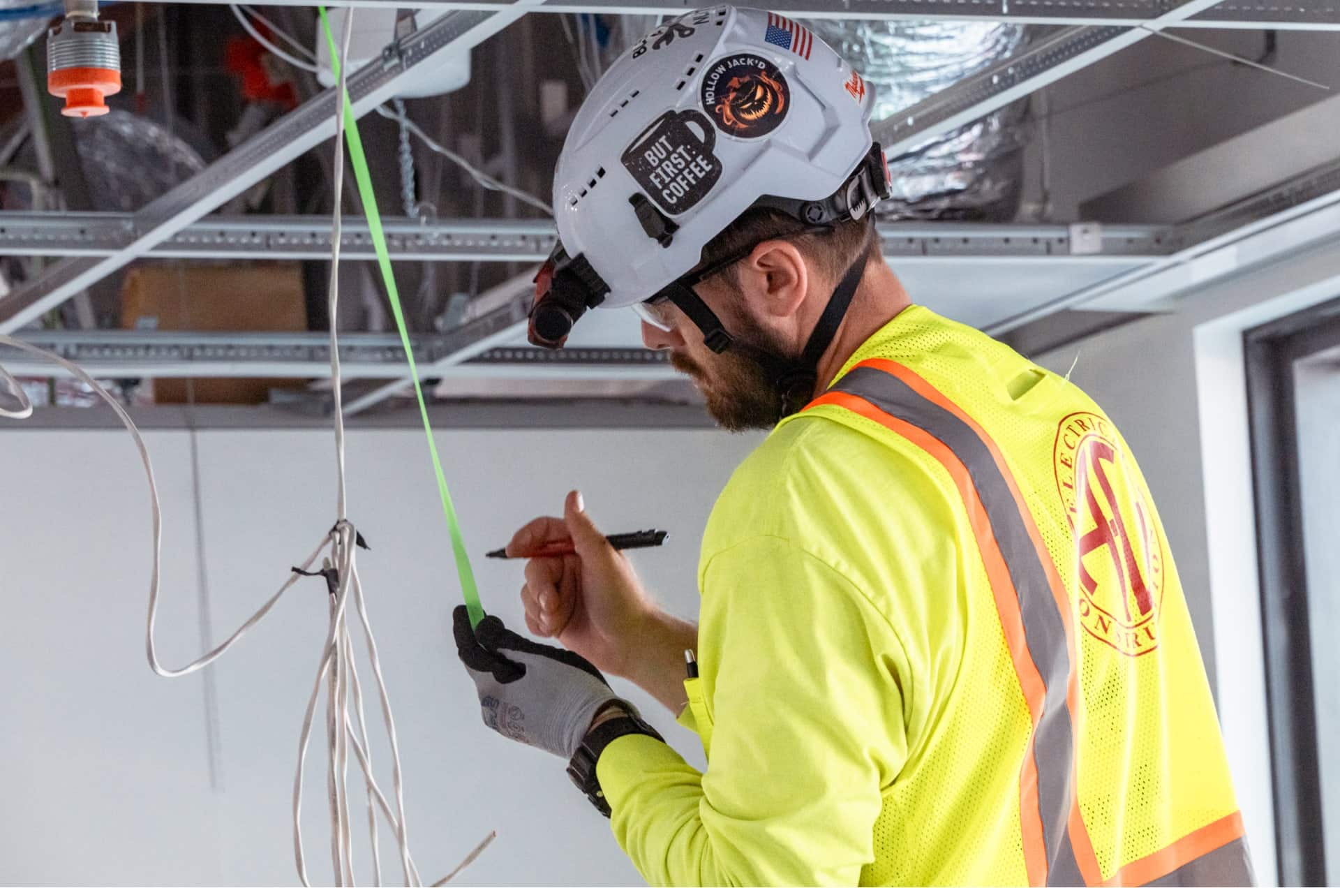 A-C Electric Company electrician during interior electric installation