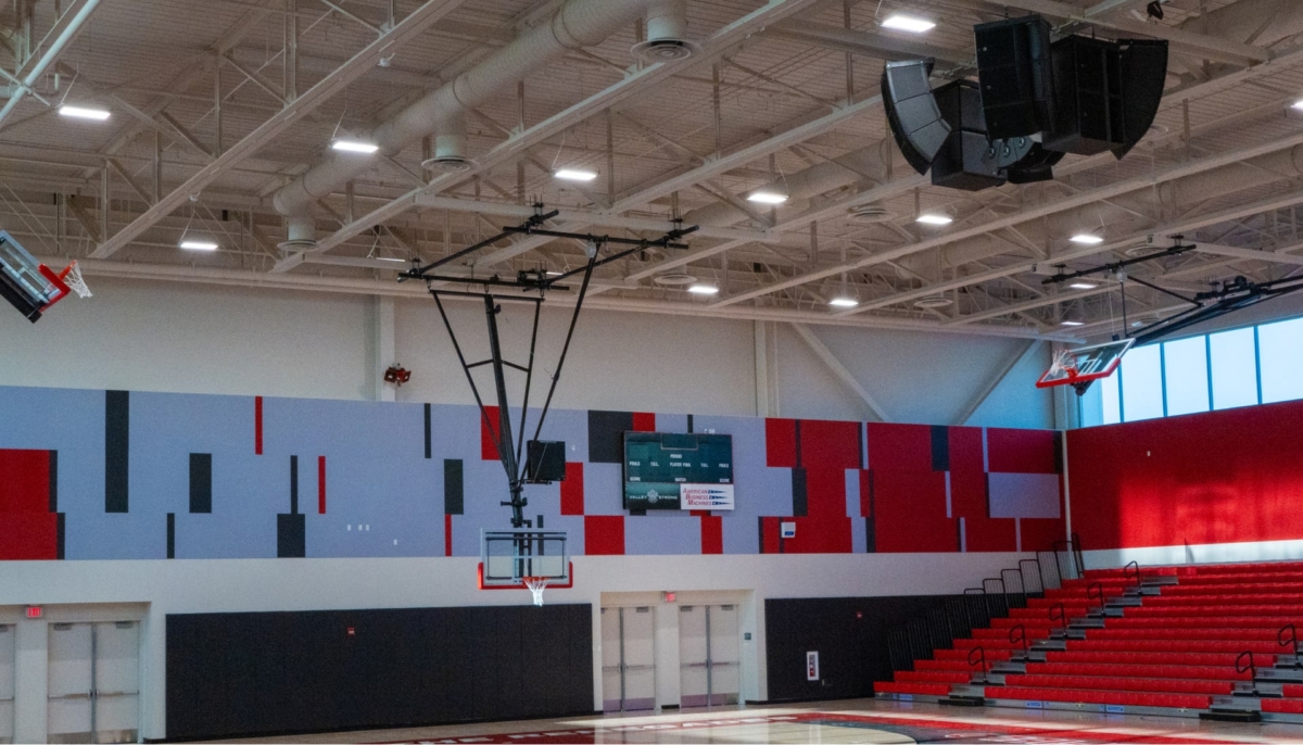 Interior commercial lighting installation inside a gym