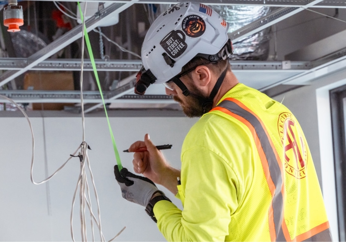A-C Electric Company electrician during interior electric installation